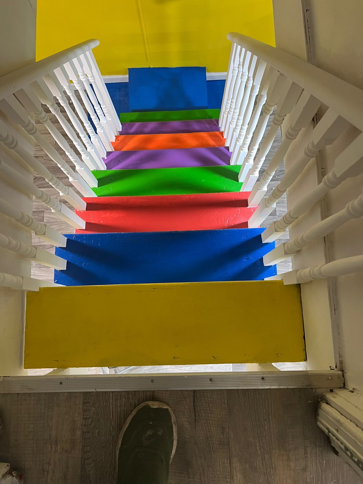 Custom painted staircase with white spindles